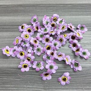Bundle of 48 purple artificial flowers. Great for crafts and diy projects. New